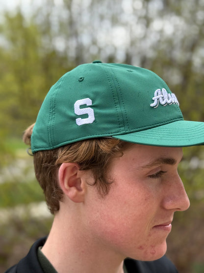 Side view of dark green alumni hat, showing the white embroidered block S. 