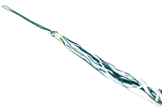 Green and white graduation souvenir tassel with gold clasp. Shown on a white background. 