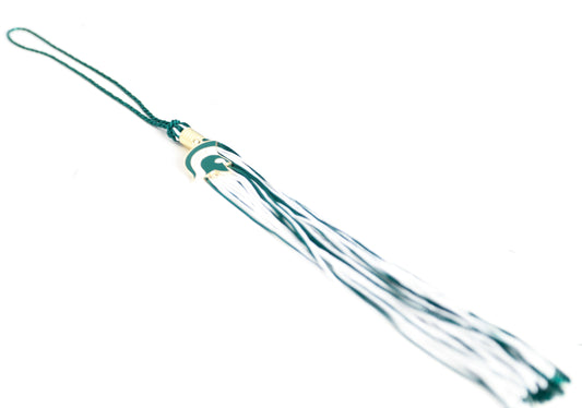 Front of green and white graduation souvenir tassel with gold clasp and a Spartan Helmet charm. Shown on a white background. 