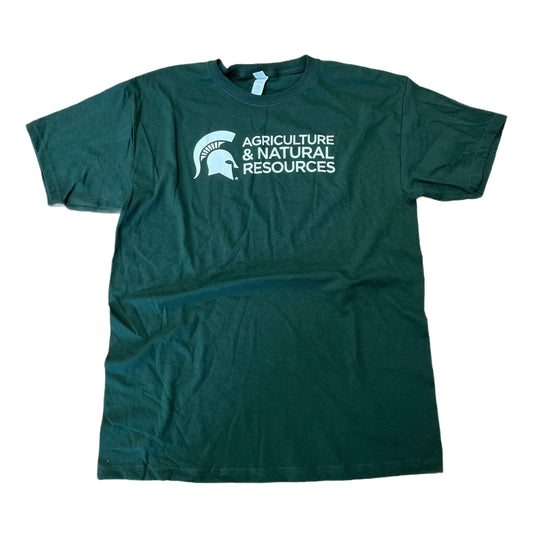  Forest green crewneck T-shirt with short sleeves. Across the center chest is all-caps white text on three lines reading “Agriculture & Natural Resources.” To the left of the text is a white Spartan Helmet logo.