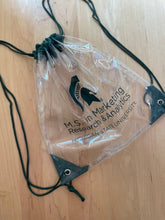 Cinched clear drawstring backpack with the M.S. in Marketing Research & Analytics Michigan State University logo printed in green. Green trim and string handles.