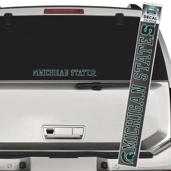 Green and white decal of text that reads "Michigan State." In front of the text is a green Spartan Helmet logo and at the end of the text is a block S.