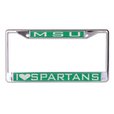 Silver license plate cover with a green plate at top with MSU in white. At the bottom of the cover is another green plate that says, 'I heart Spartans' with the word heart being represented by a heart shape.