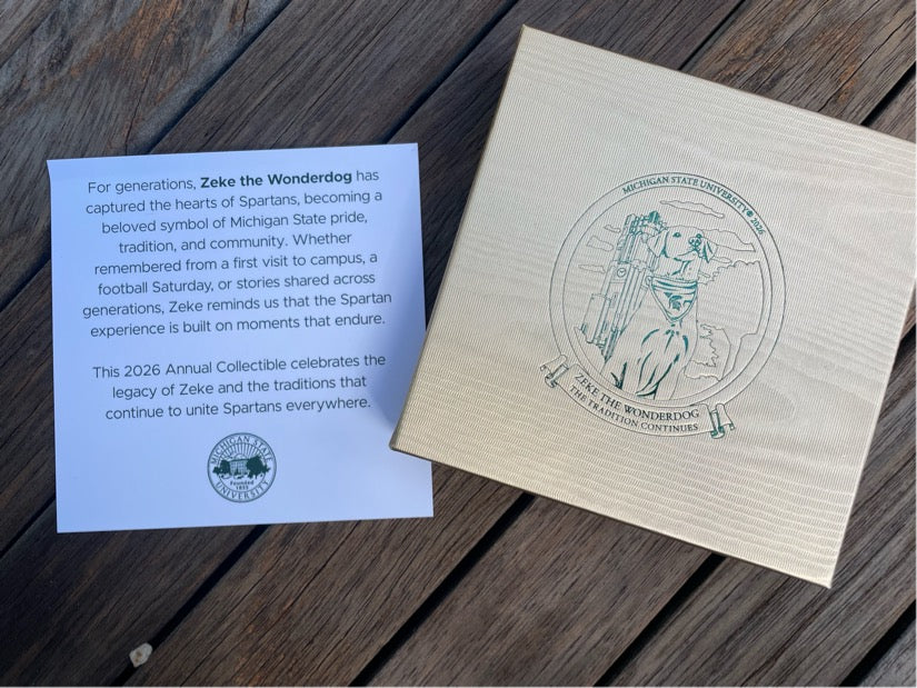 Card insert and gold box with ornament image on the front. 