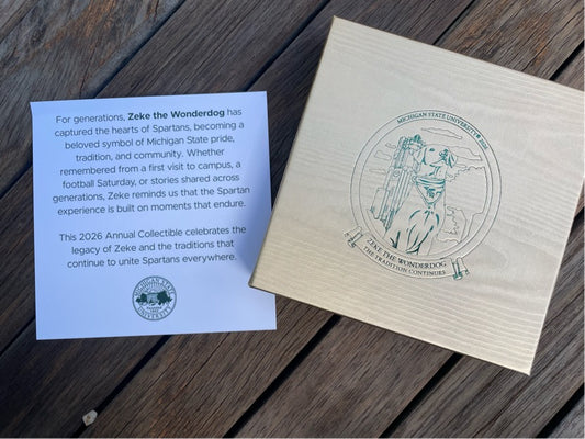 Card insert and gold box with ornament image on the front. 