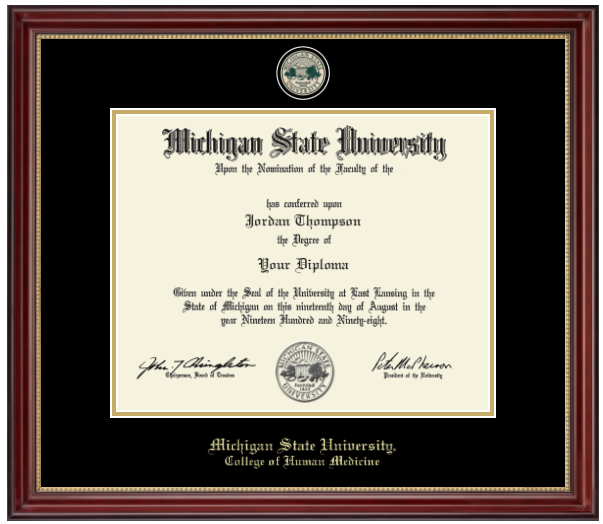 A dark cherry colored frame with gold accent on inner frame. Black matting with gold accent surrounding opening for diploma. At top is a gold engraved Michigan State University seal. Bottom of matting in gold letters 'Michigan State University'. Below in gold letters 'College of Human Medicine'.