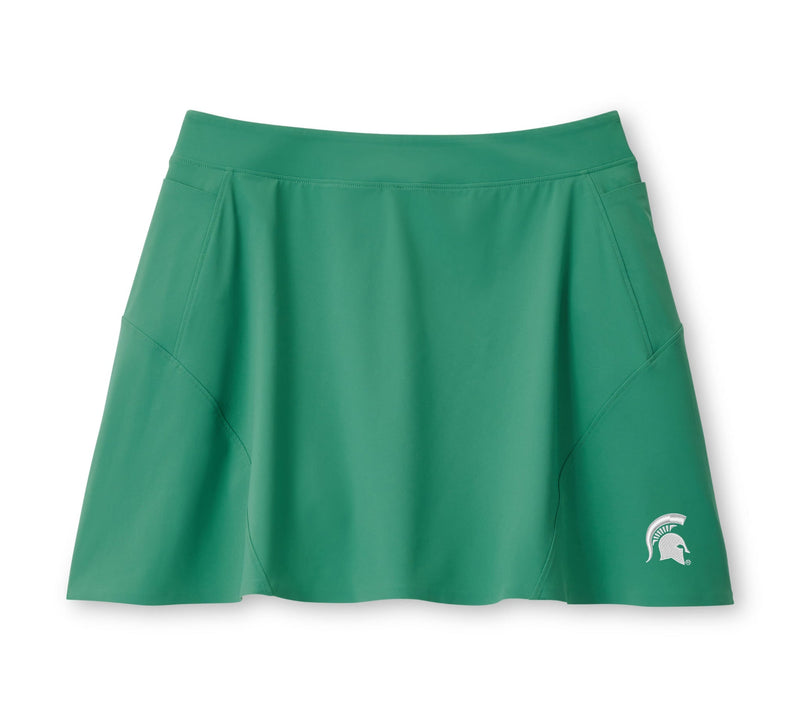 A green golf skort with a Spartan Helmet logo on the left side, designed for women.