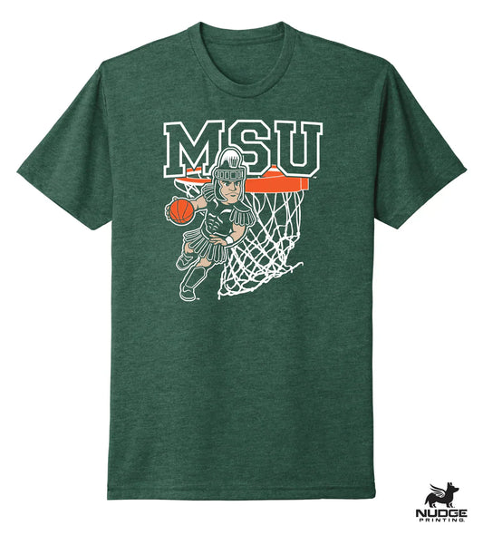 A green shirt with a design showing Sparty playing basketball below large text that reads "MSU."