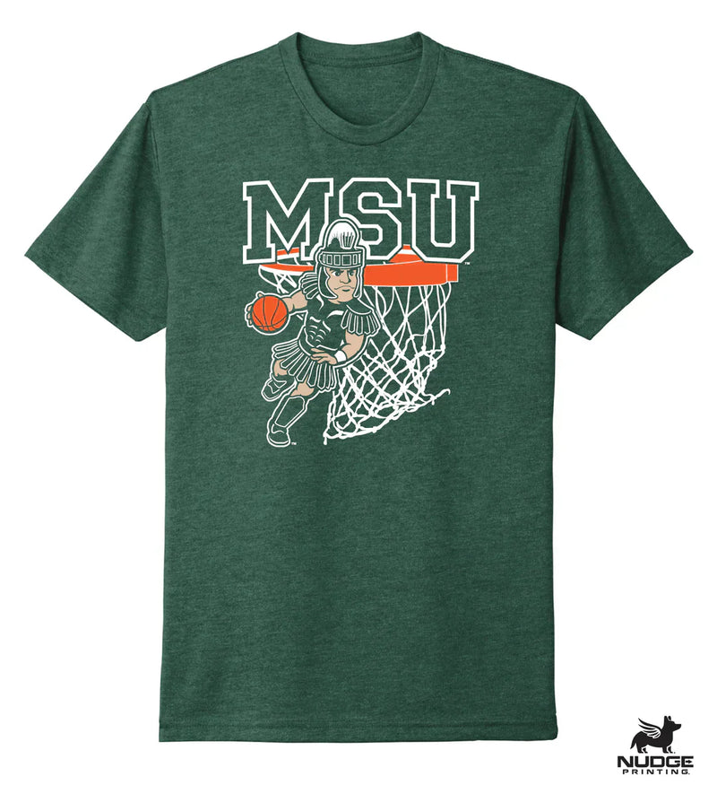 A green shirt with a design showing Sparty playing basketball below large text that reads "MSU."
