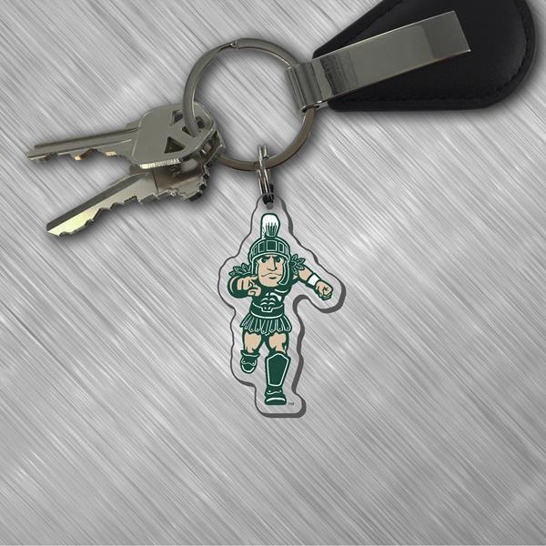 Clear acrylic keychain with a colored running Spartan logo. 