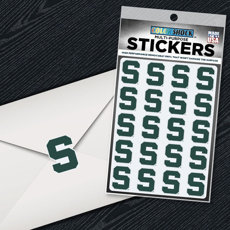 Sticker sheet labeled 'COLOR SHOCK MULTI-PURPOSE STICKERS' featuring 20 identical green Block S logos representing Michigan State University. The stickers are arranged in four rows of five.