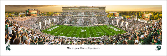 Panorama of the Michigan State Football team going head-to-head with the Western Michigan Broncos. This panorama is unframed with a white border and 30 inches by 13.5 inches. 