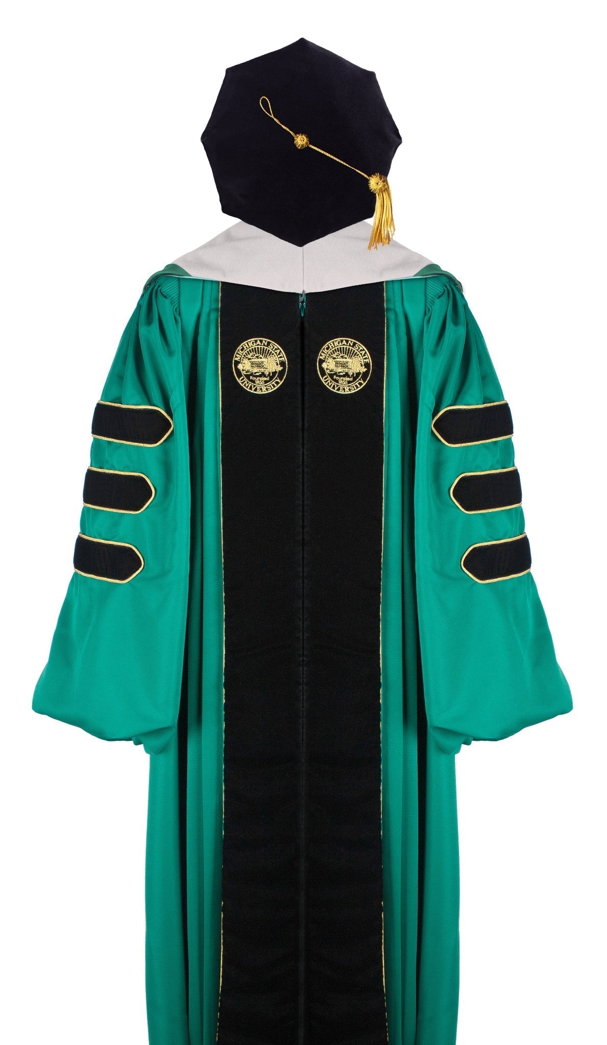 Green doctoral academic regalia gown with black velvet panels, gold piping, and three black velvet sleeve bars. Features two gold embroidered seals on the front and includes a black velvet tam with a gold tassel.