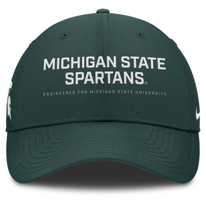 Green cap with white "Michigan State Spartans" wordmark and "Engineered for Michigan State University" subtext. On the right side of the hat there is a white Spartan Helmet logo and on the left side there is a white Nike logo. 