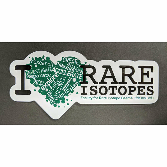 Green heart with a variety of words cutout in white such as accelerate, explore, and discover. To the left is a large black serif letter I, with two lines of the same font on the right-hand side spelling out "rare isotopes." Below the isotopes line, green text reads "Facility for Rare Isotope Beams, FRIB.MSU.EDU." The sticker has a thick white border that follows the shape of the graphics and text.