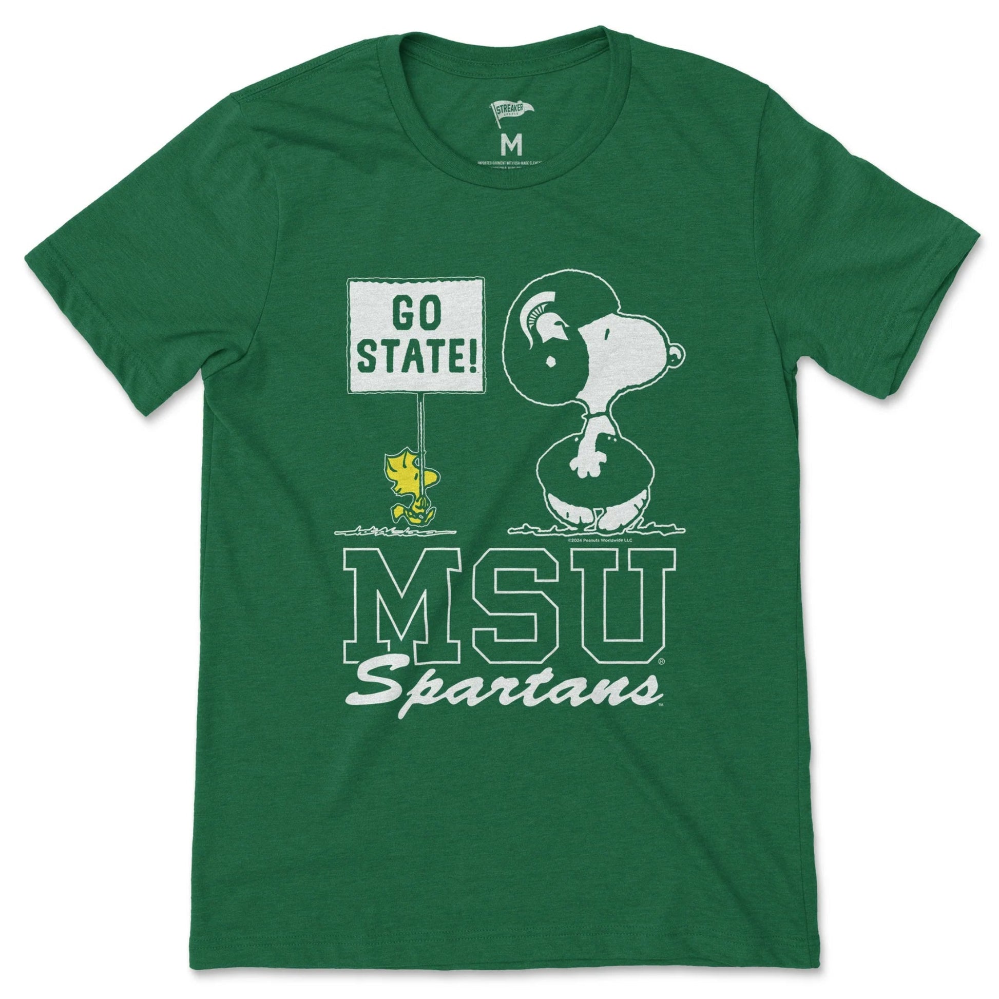 Green Michigan State Spartans T-shirt featuring Snoopy wearing a Spartan helmet, Woodstock holding a “GO STATE!” sign, and large “MSU Spartans” lettering.