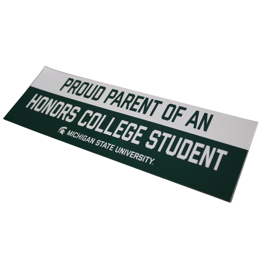 A rectangular bumper sticker with a forest green and white color scheme. The top portion is white with forest green text that reads "Proud Parent of an." The bottom portion is forest green with white text that reads "Honors College Student." Below that, the Spartan Helmet logo and the text "Michigan State University" are displayed in white.