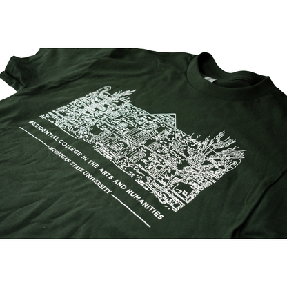 Close-up of the front of a forest green crewneck T-shirt with a white illustrated outline of Snyder-Phillips hall on the center chest. Below that in small all-caps is text reading "Residential College in the Arts and Humanities" above a smaller line of test reading "Michigan State University."