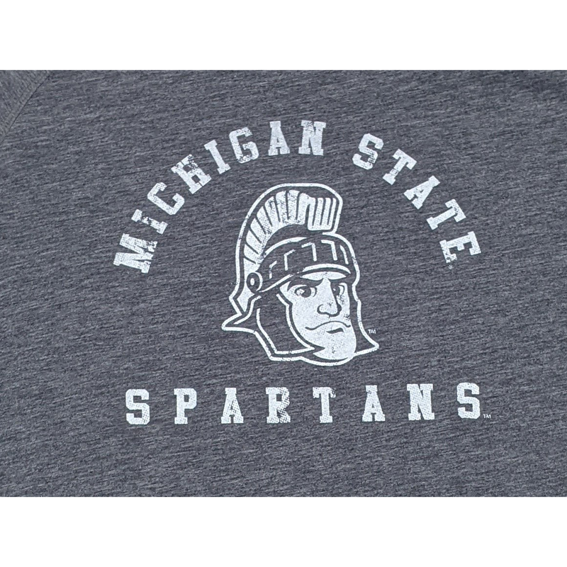 Close-up of a white screen printed rendition of Sparty's head is printed between arched text reading Michigan State and a straight line of text reading Spartans.