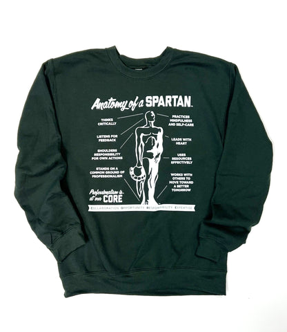 Forest green sweatshirt. On the center chest is a white graphic titled "Anatomy of a Spartan" with lines connecting various points of an illustrated Spartan statue to text blocks.