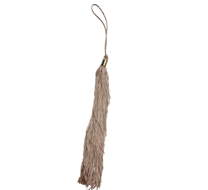 Drab color graduation tassel. 