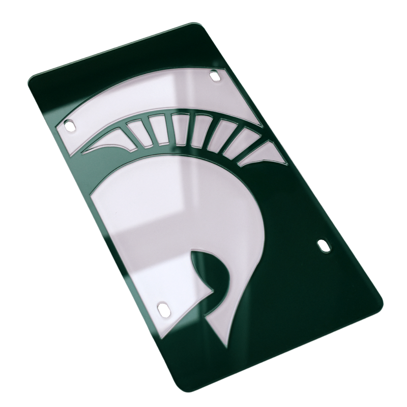 Dark green license plate with four screw slots. A white Spartan helmet is tipped at a slight diagonal angle and blown up to expand outside of the visible frame.