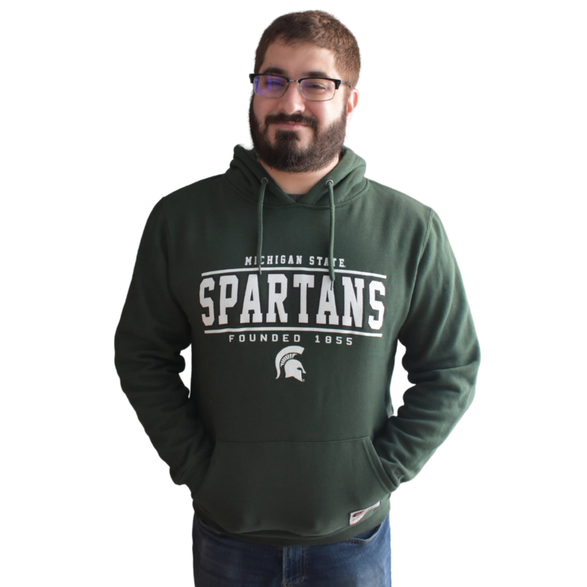 Man modeling the hoodie with his hands in the kangaroo pocket and the hood down.