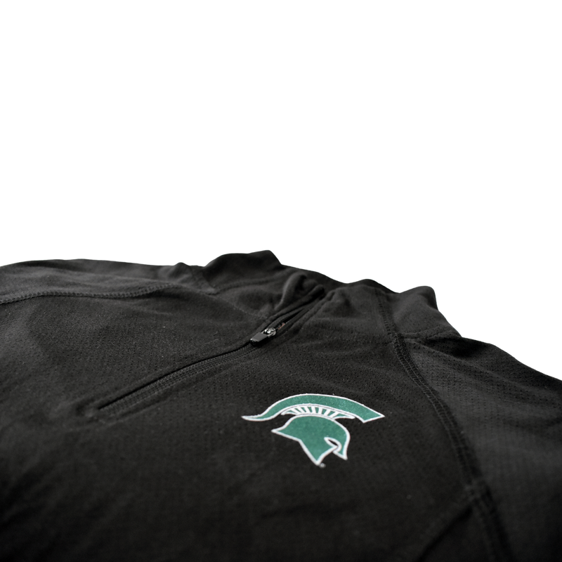 Close up of the helmet on the chest and the raglan style contours leading to the quarter-zip collar.