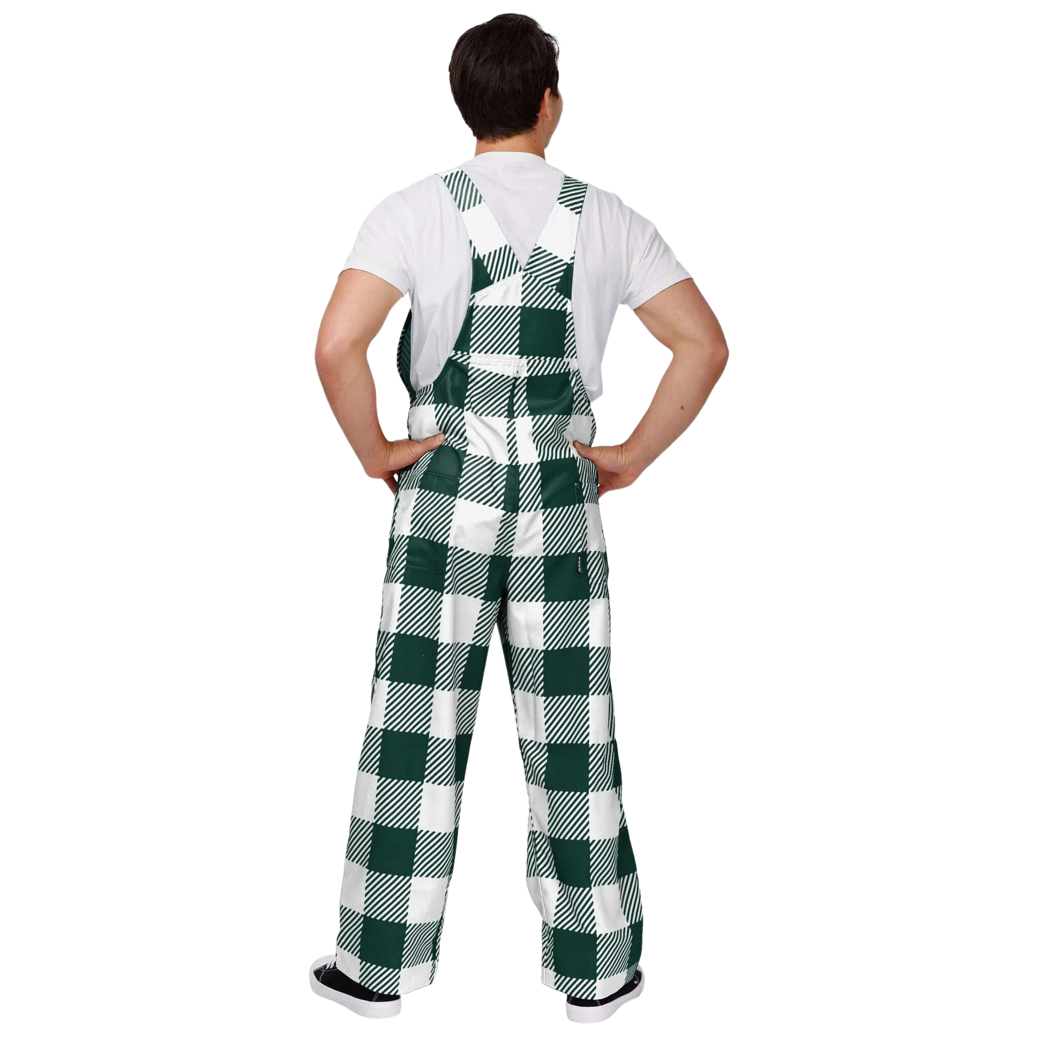 The back of the person wearing plaid Michigan State overalls. The colors alternate between green and white. In the center torso is a green MSU helmet logo.