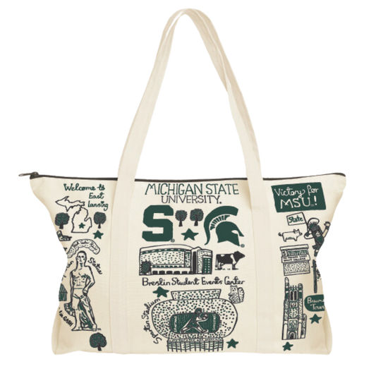 Natural colored canvas bag with two straps, a green zippered top, and an artist's MSU illustration design painted in green and black on the bag.
