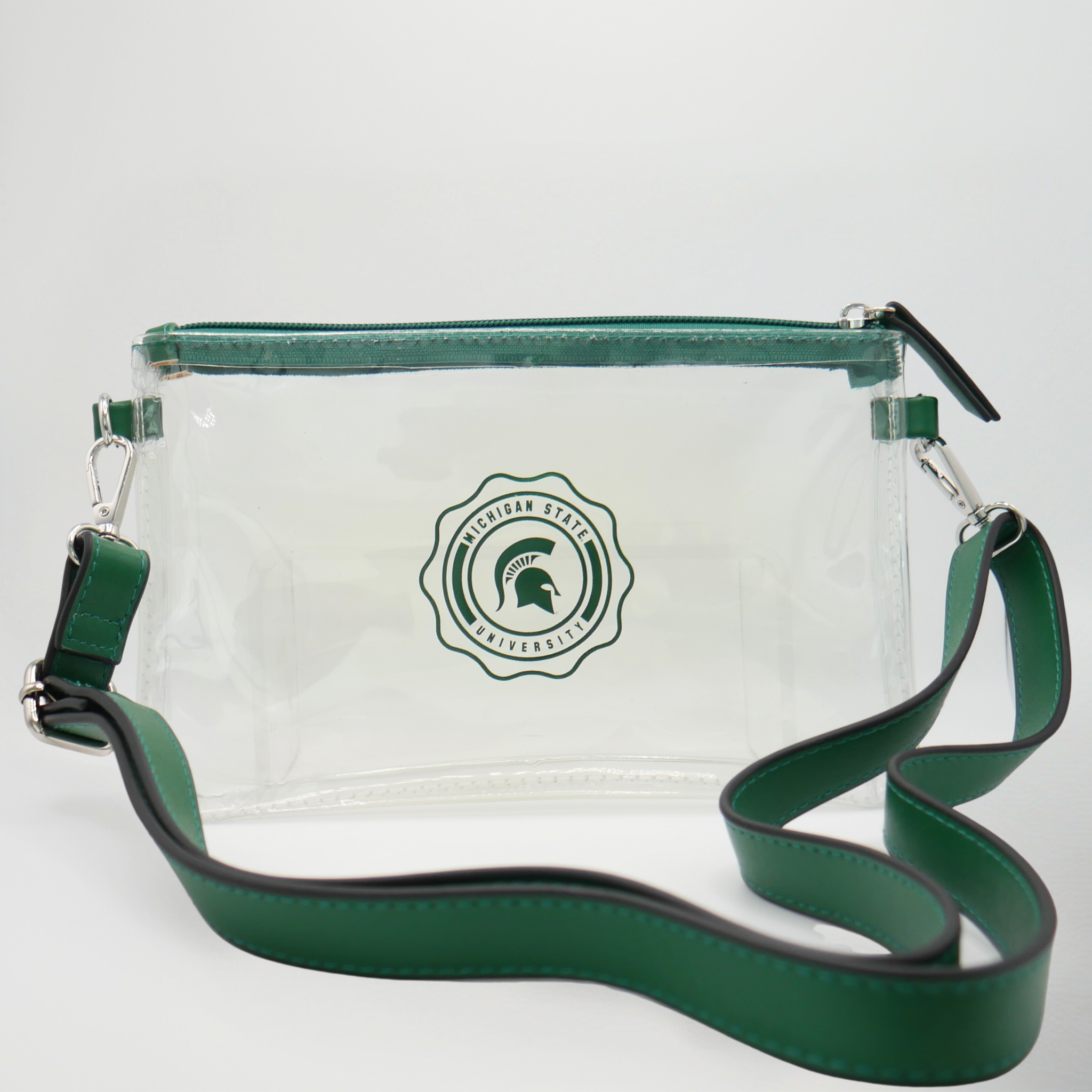Clear pouch with green strap and Michigan State University logo on a white background