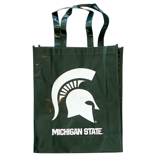 A dark green reusable laminated tote bag. On the side of the bag reads "Michigan State" in white with a large white Spartan Helmet logo above the text. 