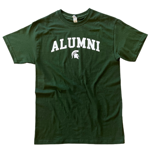 Forest green crewneck T-shirt with short sleeves. Centered on the chest, white block letters read “Alumni” in a slight arch over a small white Spartan Helmet logo.