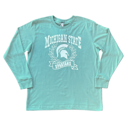 A mint green long sleeve T-shirt with Michigan State Spartans front center design in white. A wreath surrounds a white Spartan Helmet logo. 