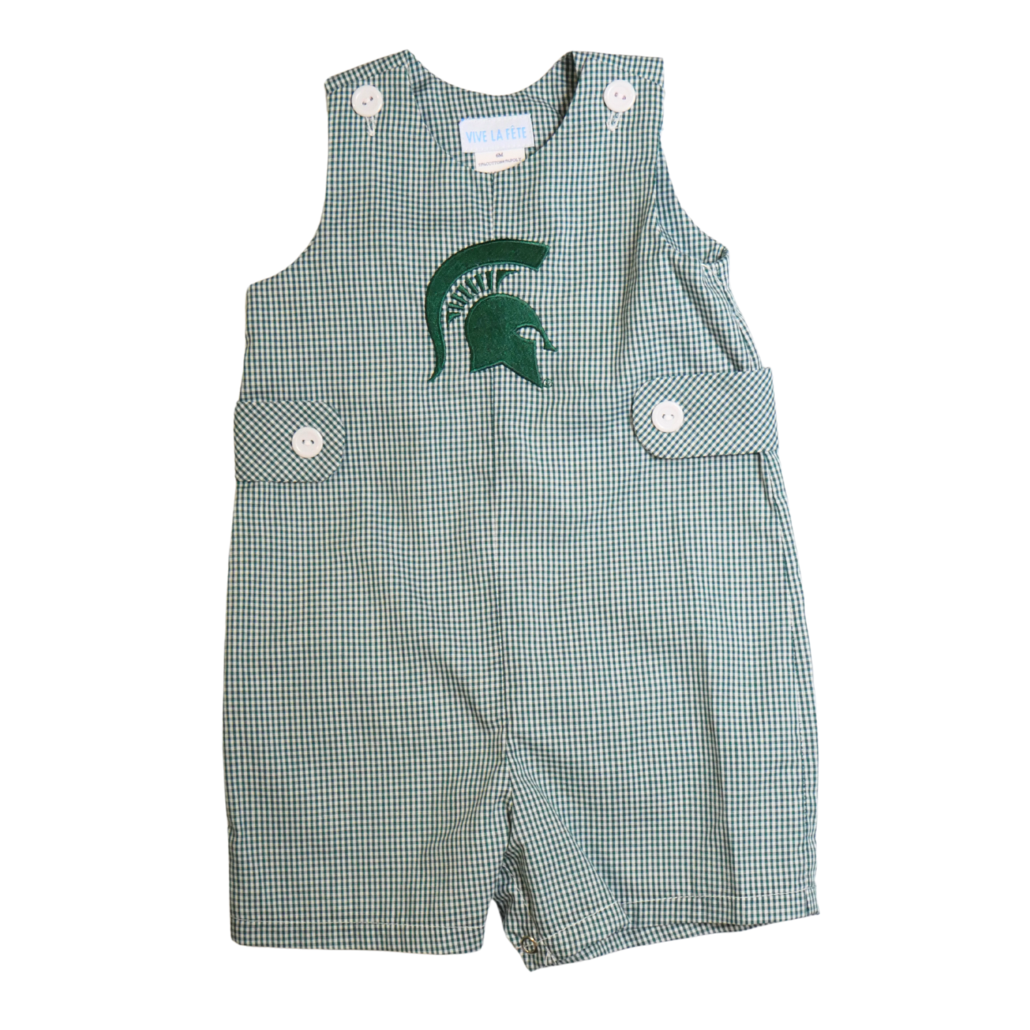 Front of a green and white plaid overall. The overalls feature top shoulder button closures and decorative button sides, with all buttons in white. A dark green Spartan Helmet is embroidered on the center chest.
