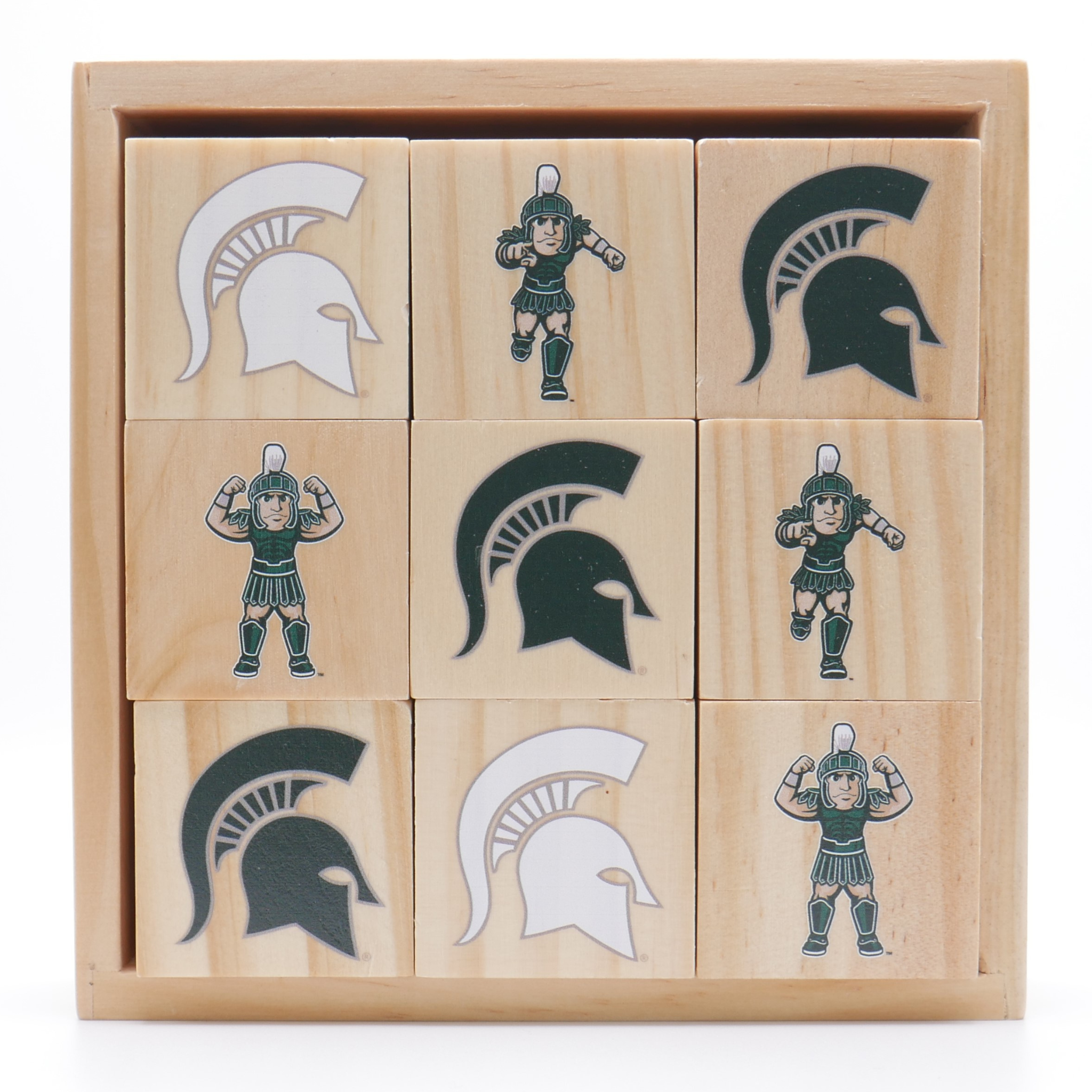A set of nine wooden play blocks stacked 3 by 3 inside a wooden box. The blocks are showing various icons of Sparty and the MSU spartan helmet logo.