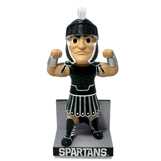 8 inch Sparty Mascot bobblehead flexing both arms. Sparty is on a gray stand with a dark green facade that has athletic font spelling out "Spartans" in all caps.