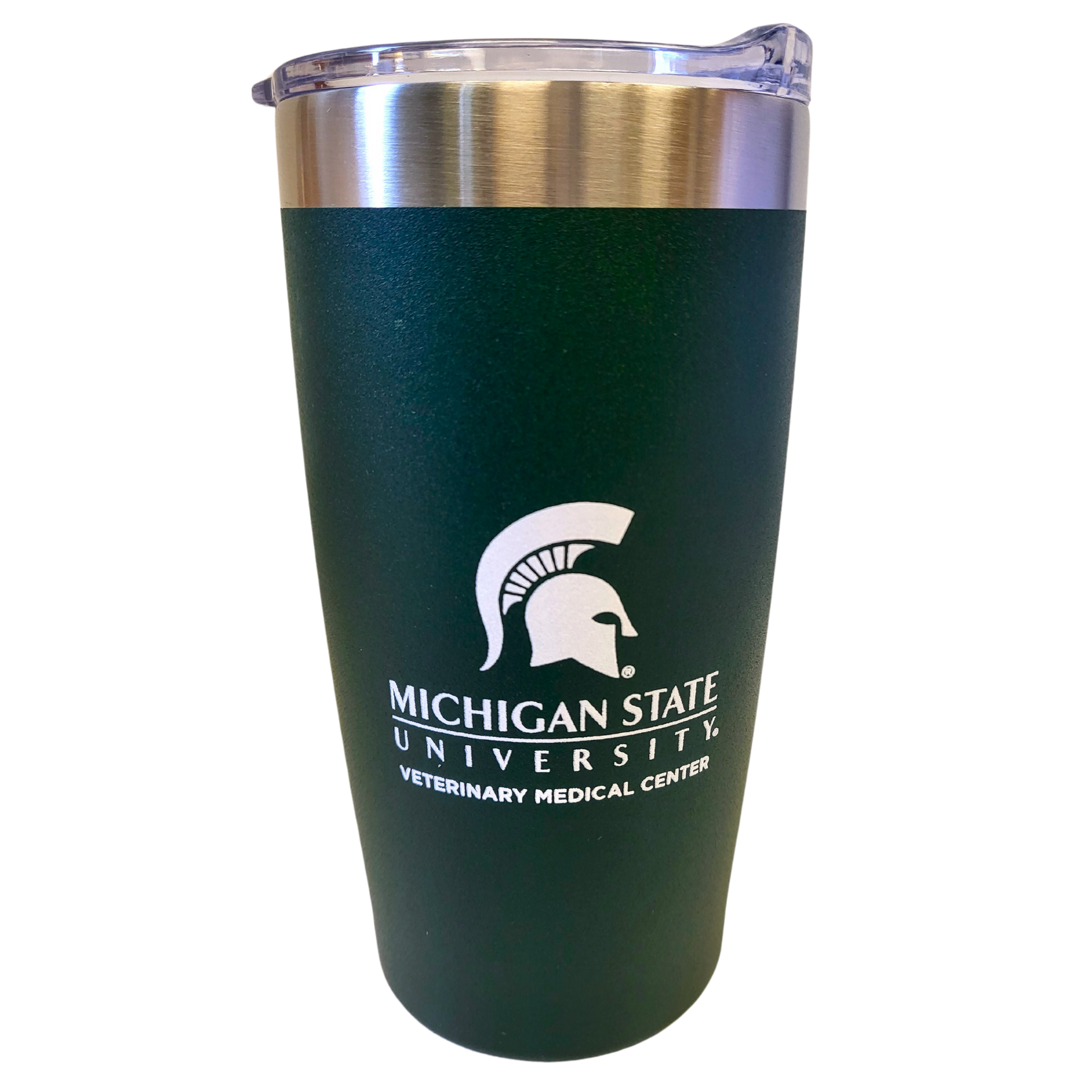 A curved stainless steel drink tumbler with a forest green powder coating and a silver rim at the top. Printed in white on one side is a large Spartan Helmet logo centered over the Michigan State University wordmark logo and bold block letters reading “Veterinary Medical Center.”