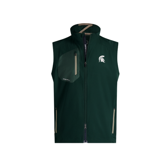 Michigan State Spartans dark green full-zip performance vest featuring a white Spartan helmet logo on the left chest. The sleeveless vest has a stand collar, contrasting zippered chest pocket, two zippered front pockets, and a lightweight water-resistant design, shown against a black background.