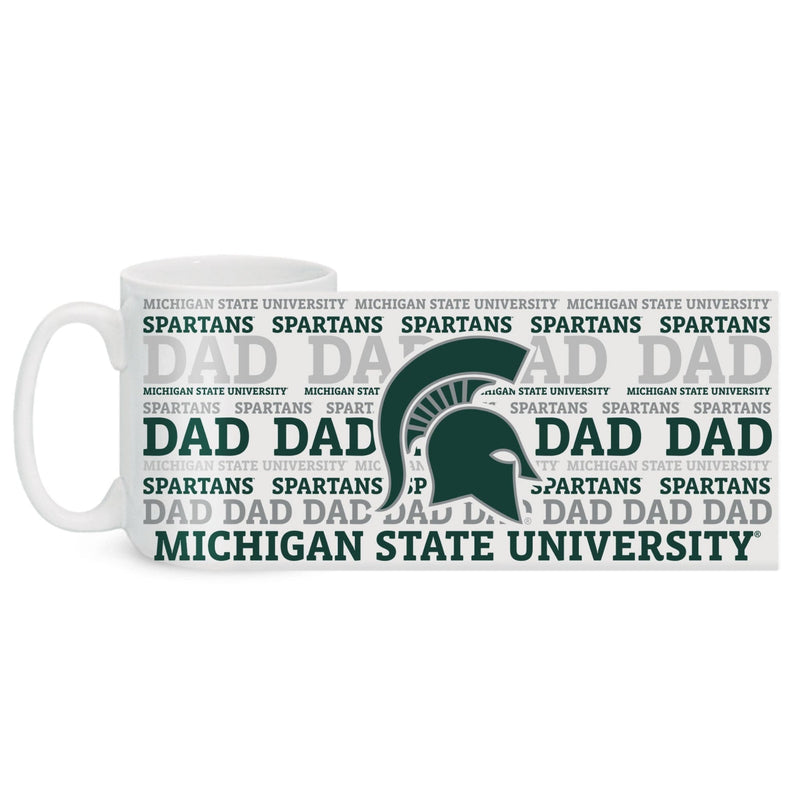 A white ceramic mug with grey and green text and logos, featuring the Michigan State University Spartan helmet and the word 'DAD' repeated with 'SPARTANS' and 'MICHIGAN STATE UNIVERSITY' text elements.