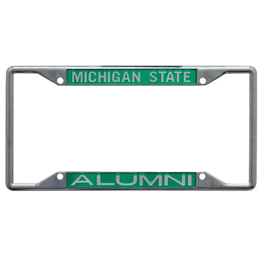 Chrome license plate frame with green inserts featuring 'MICHIGAN STATE' in white text on the top and 'ALUMNI' in white text on the bottom.