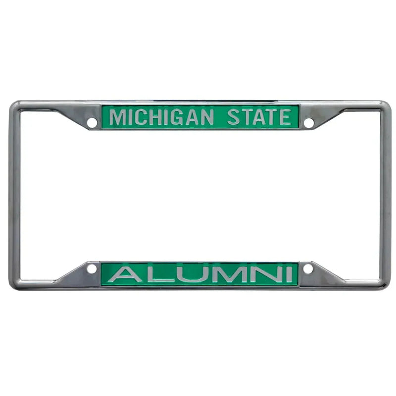 Chrome license plate frame with green inserts featuring 'MICHIGAN STATE' in white text on the top and 'ALUMNI' in white text on the bottom.