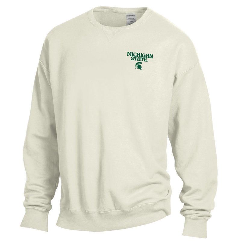 The front of a white crewneck that reads "Michigan State" in a groovy font above a green Spartan helmet logo on the upper left chest.