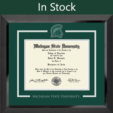 The frame is black with a glossy finish. The matte is green with white trim, featuring the Spartan Helmet logo at the top and "Michigan State University" printed at the bottom.