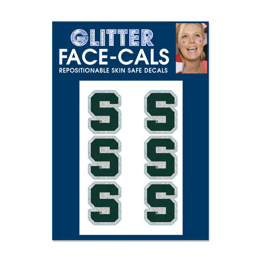 Michigan State Spartans glitter face decals package featuring six green block "S" decals with silver glitter borders on a blue backing card.