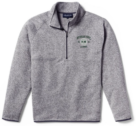 A heathered gray quarter-zip sweatshirt featuring the MSU seal and the words "Michigan State Alumni" in green on the upper left chest.