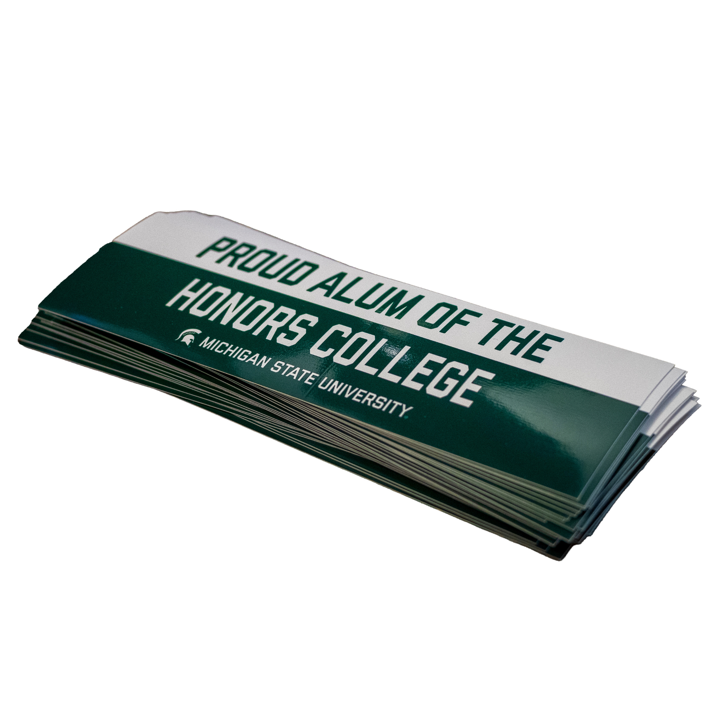 Green and white bumper sticker that reads 'PROUD ALUM OF THE HONORS COLLEGE' 