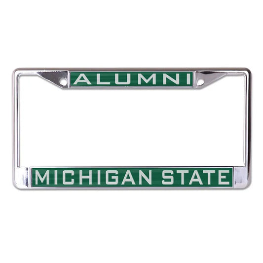 Green and silver license plate with "Alumni" written across the top and "Michigan State" written across the bottom. 