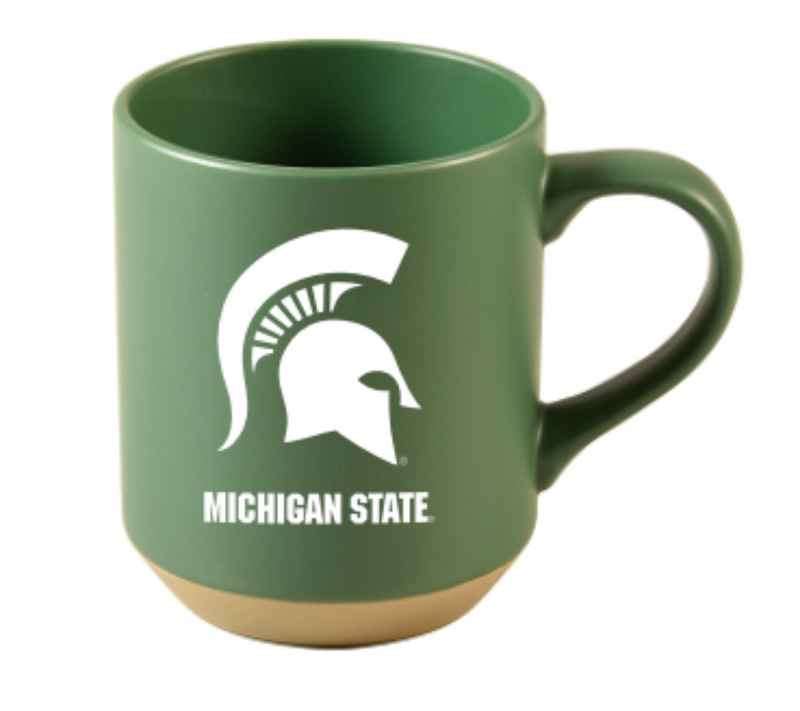 Green ceramic mug with cork bottom. Large Spartan Helmet in white with the words 'Michigan State' in white under Helmet. 