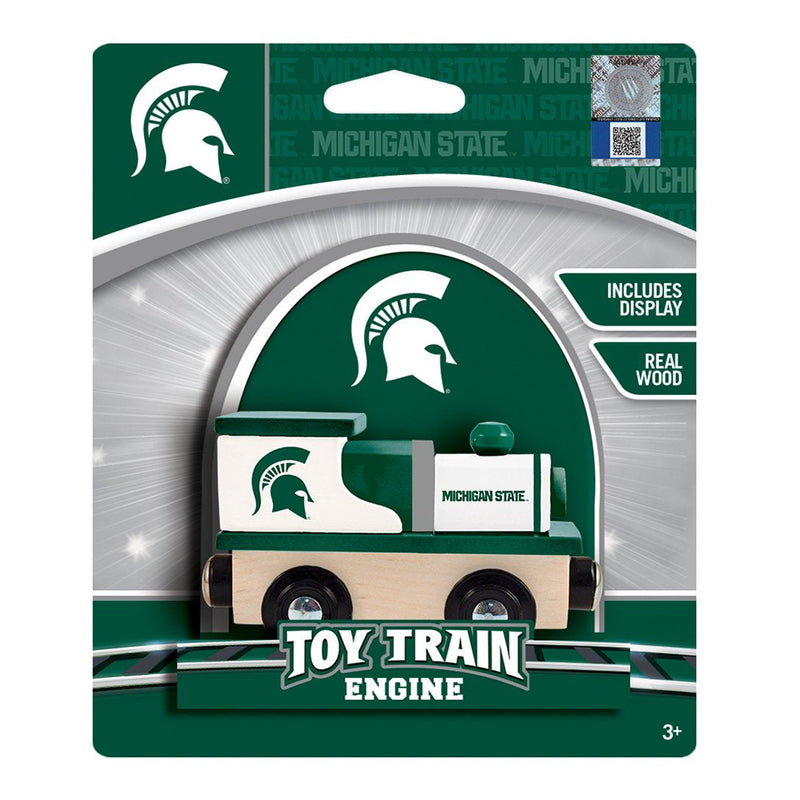 A small, wooden train set piece painted green and white. It features the Spartan helmet logo and the Michigan State wordmark logo. The packaging reads "Toy train engine, includes display, real wood."